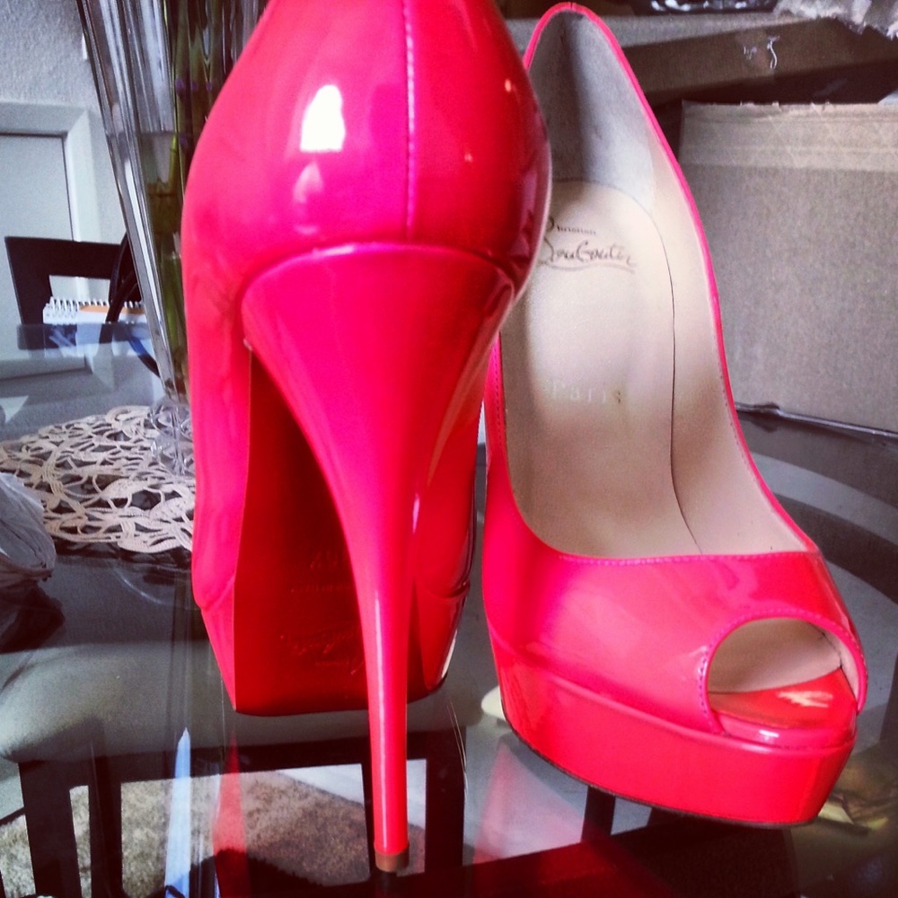 Christian Louboutin Size 36.5. Worn but good condition.